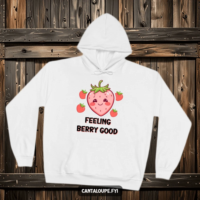 Funny hoodie depicting a happy strawberry character with a ridiculous silly face, offering cozy comfort and a humorous touch.